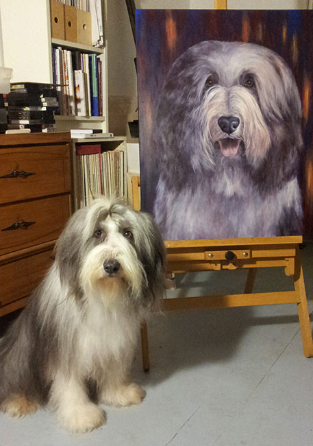 Bearded Collie posing with painting